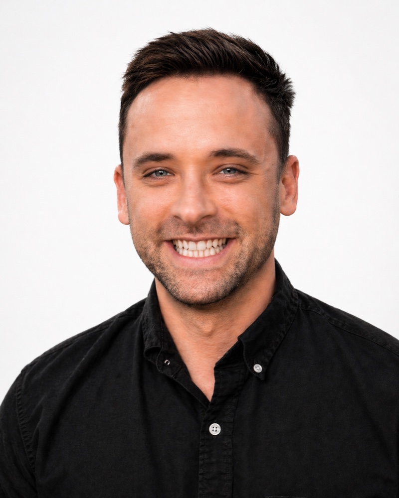 Brad Thomas in his original light-background studio portrait